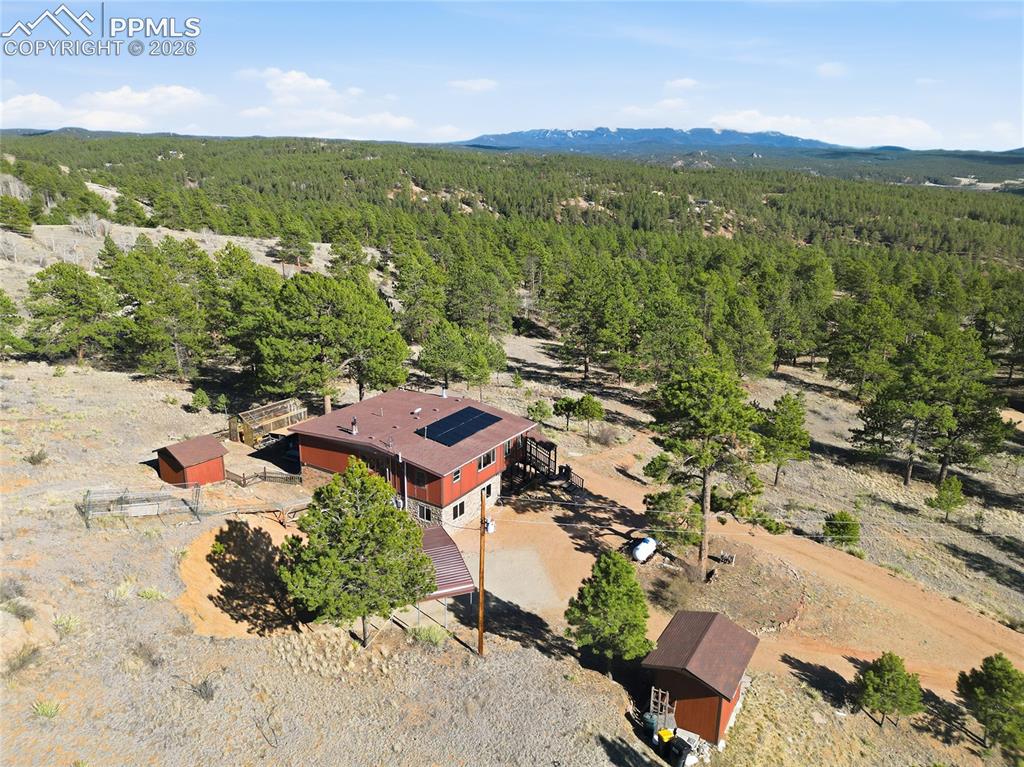 Image 48 of 49: Aerial view of the property taken from the west.