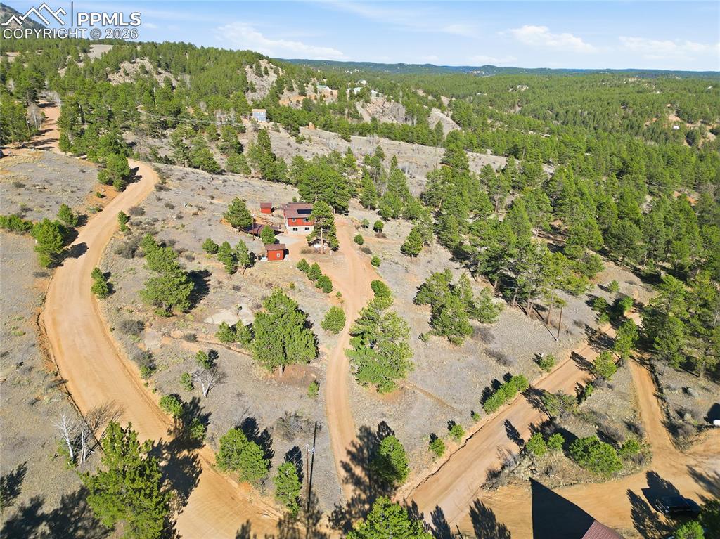Image 49 of 50: Aerial view of the entire property area.