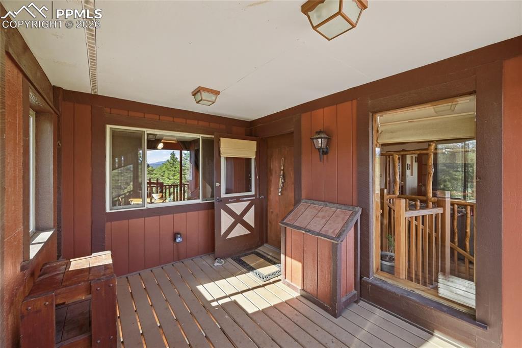 Image 8 of 50: Covered front door entrance