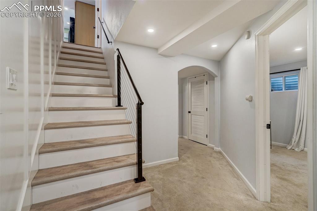 Image 20 of 46: Stairs to the walk out basement
