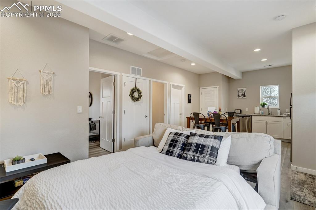 Image 32 of 46: Living room with pull out sofa and dining room
