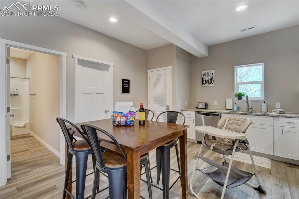 Image 39 of 46: Cottage Dining area and kitchen area