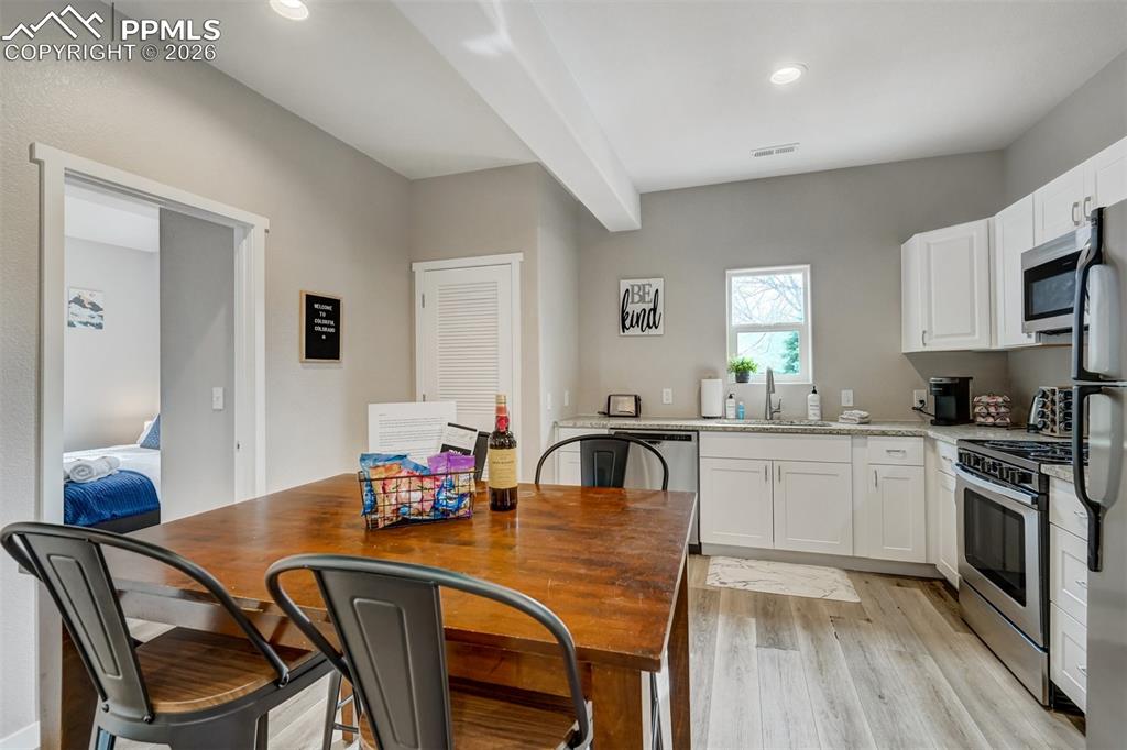Image 40 of 46: Cottage Dining area and kitchen