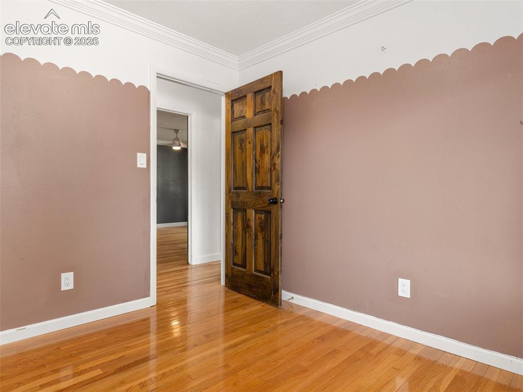 Image 19 of 35: Rich wood-finish flooring