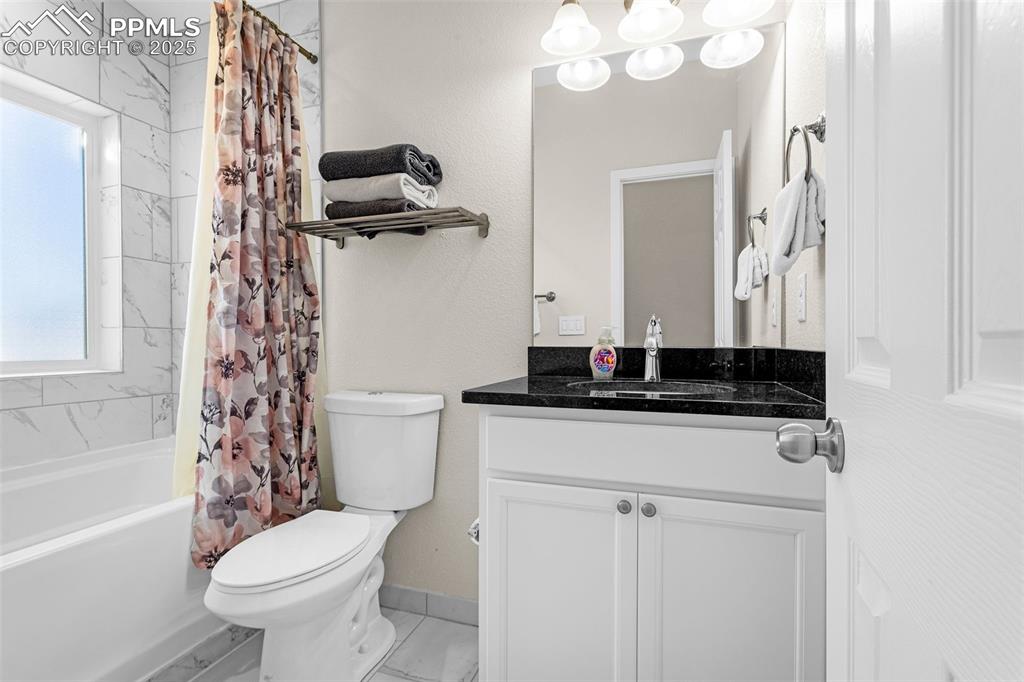 Image 21 of 37: Upper Level Bathroom