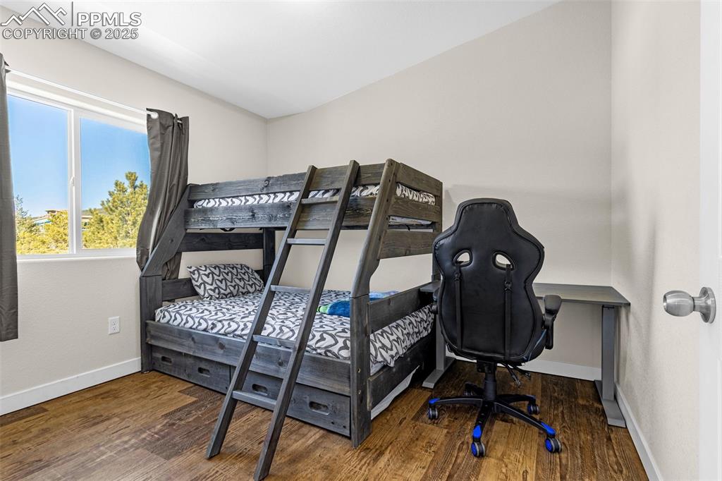 Image 22 of 37: Upper Level Bedroom