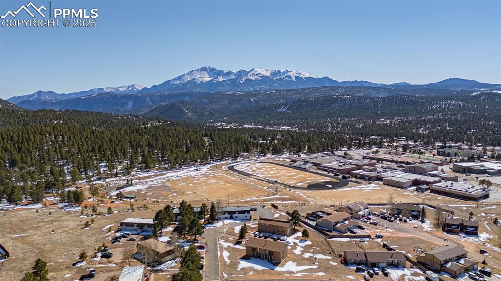 Image 33 of 37: Aerial view featuring a mountain view