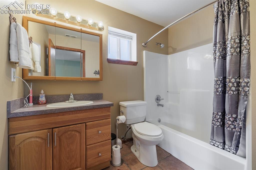 Image 24 of 33: Full bathroom lower level
