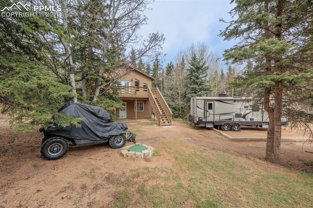 Image 33 of 33: Front yard with RV parking 