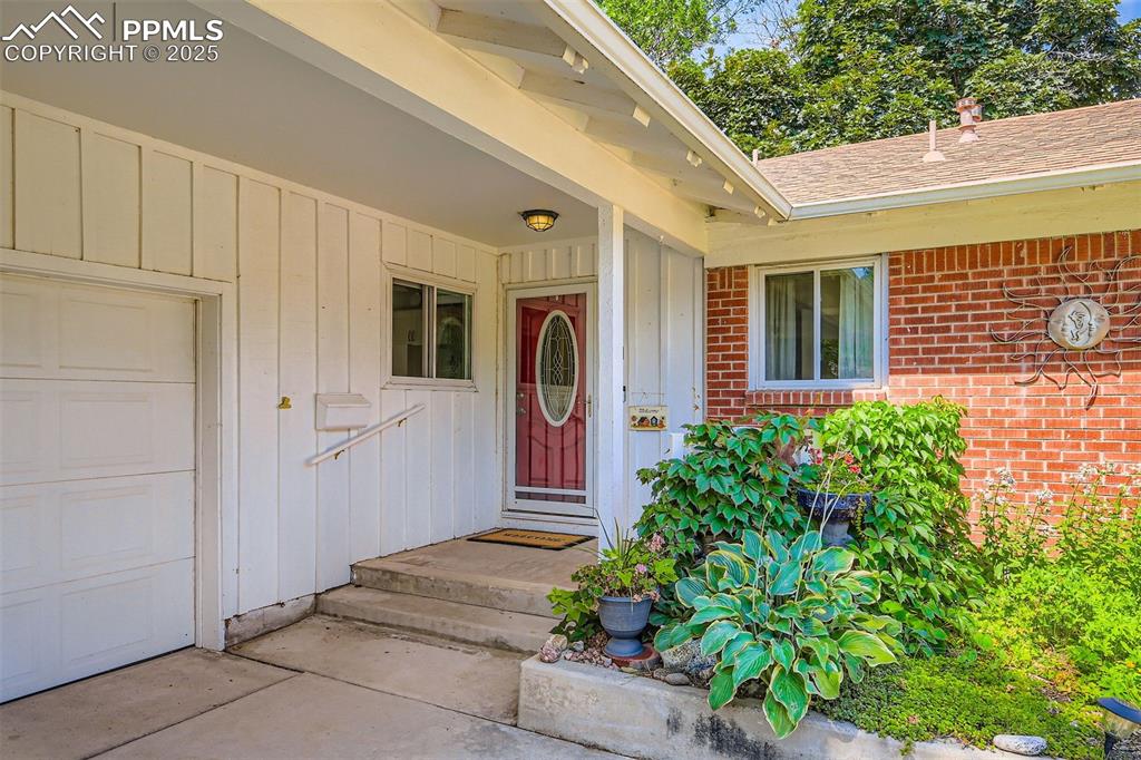 Image 4 of 33: Covered Entry - Oversized two car garage