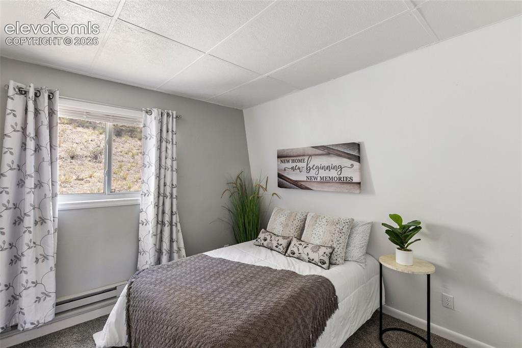 Image 17 of 40: Main level bedroom
