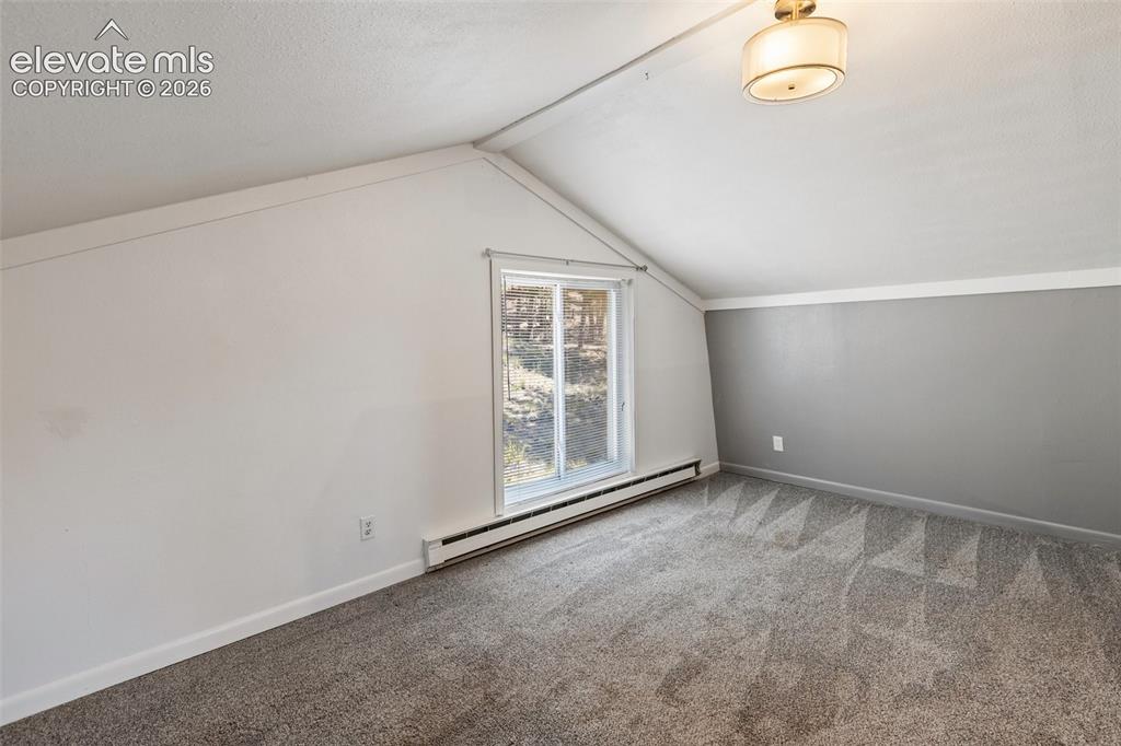 Image 23 of 40: 2nd side of the upper level bedroom