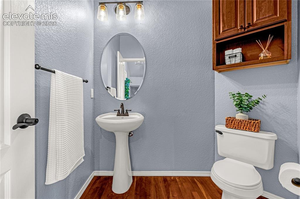 Image 31 of 41: Main level half bath