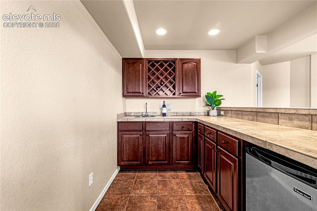 Image 33 of 41: Basement Wet Bar
