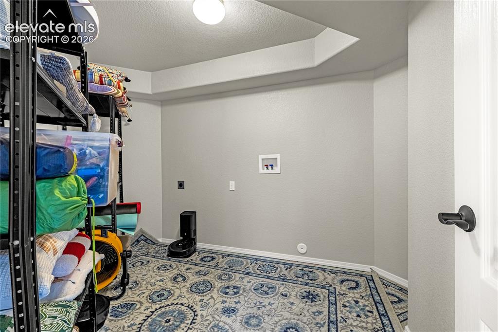 Image 38 of 41: Storage and 2nd laundry hookups in basement