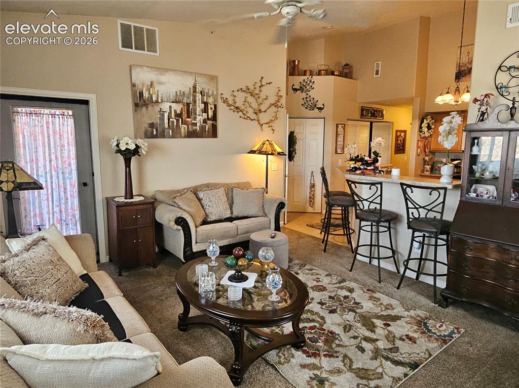 Image 5 of 24: open concept with high vaulted ceilings