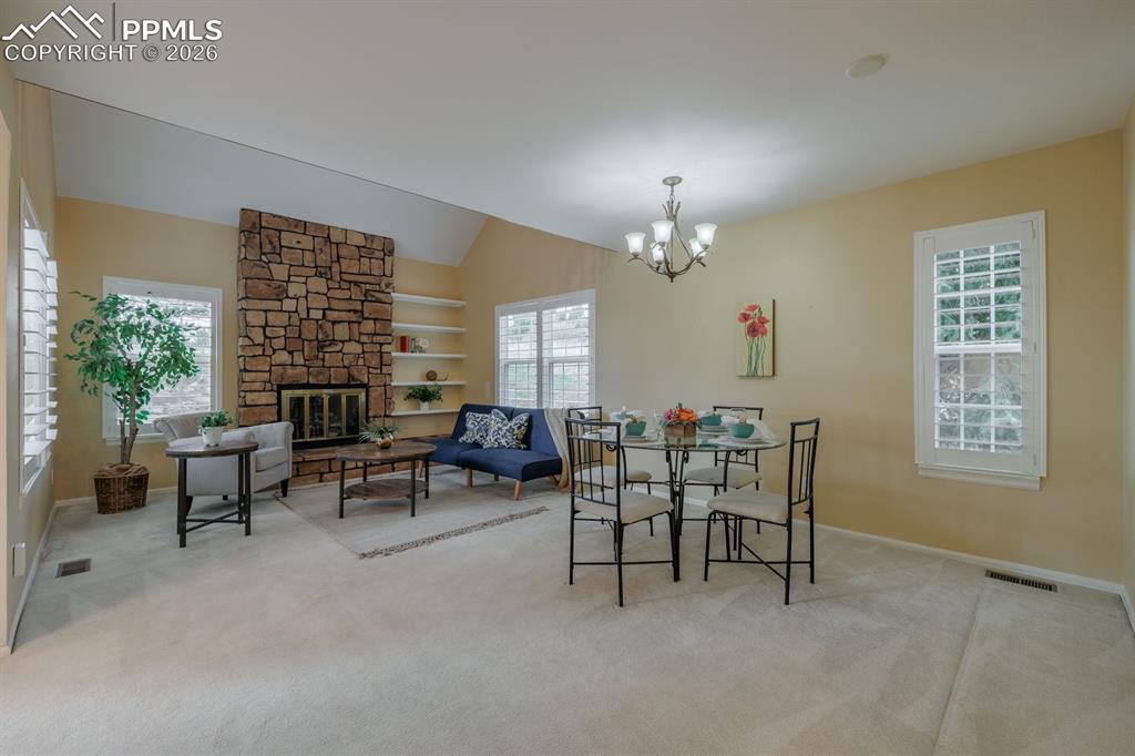 Image 11 of 47: Dining and living room great room; wonderful flowing floor plan