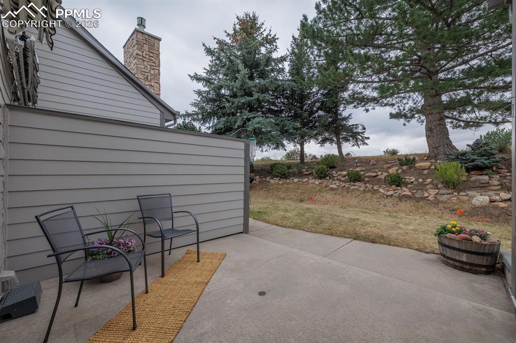 Image 19 of 47: Fabulous patio with path to open space and community pool
