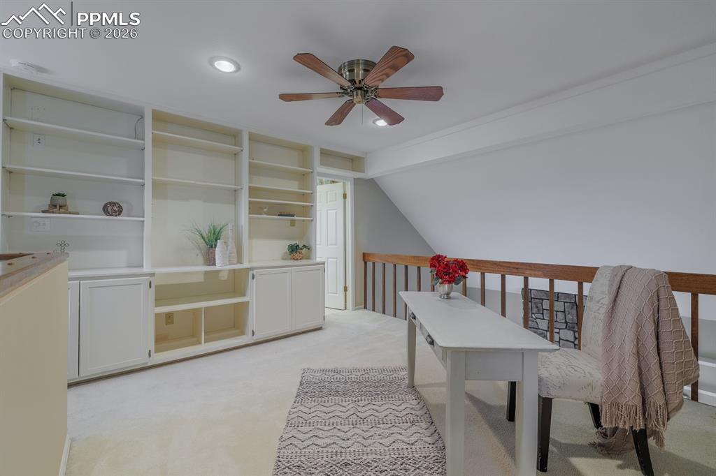 Image 21 of 47: Upstairs primary retreat complete with loft outside bedroom