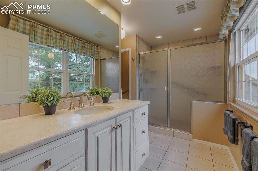 Image 26 of 47: Primary bathroom. Spa shower and of course views!!