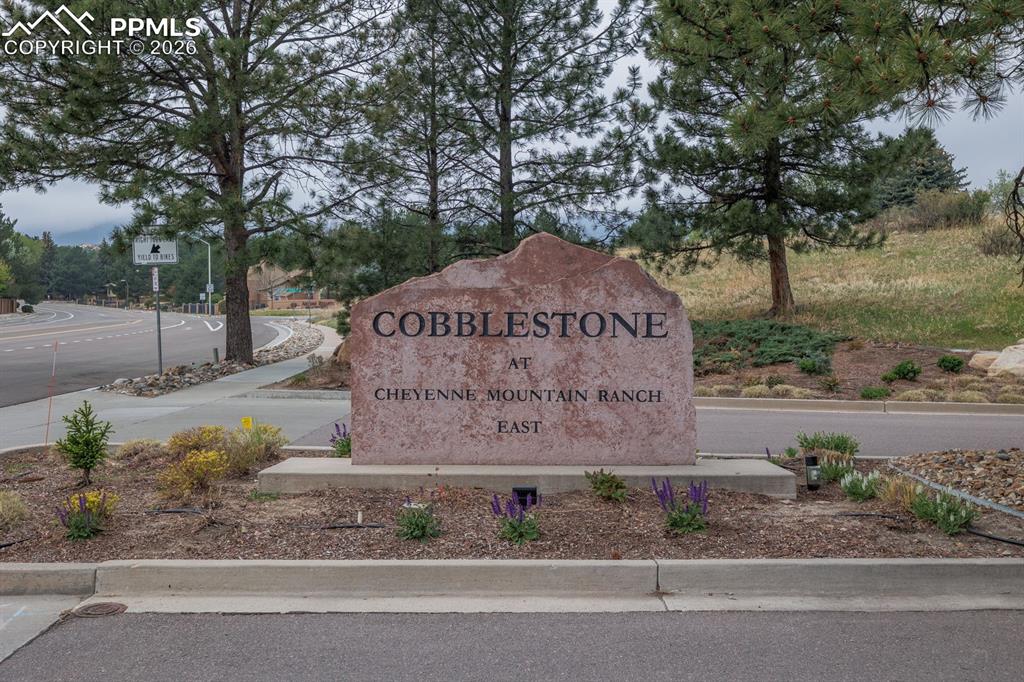 Image 43 of 47: Great Cobblestone neighborhood complex with community pool at the foot of C