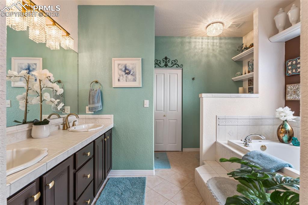 Image 18 of 50: Master Bathroom