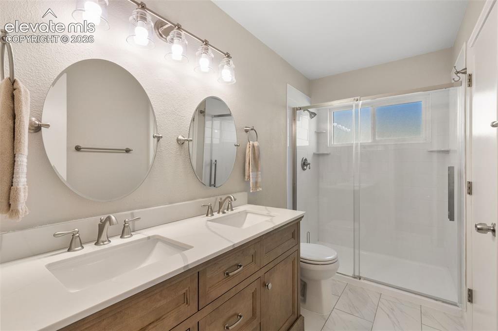 Image 10 of 35: Main Level Primary Bath