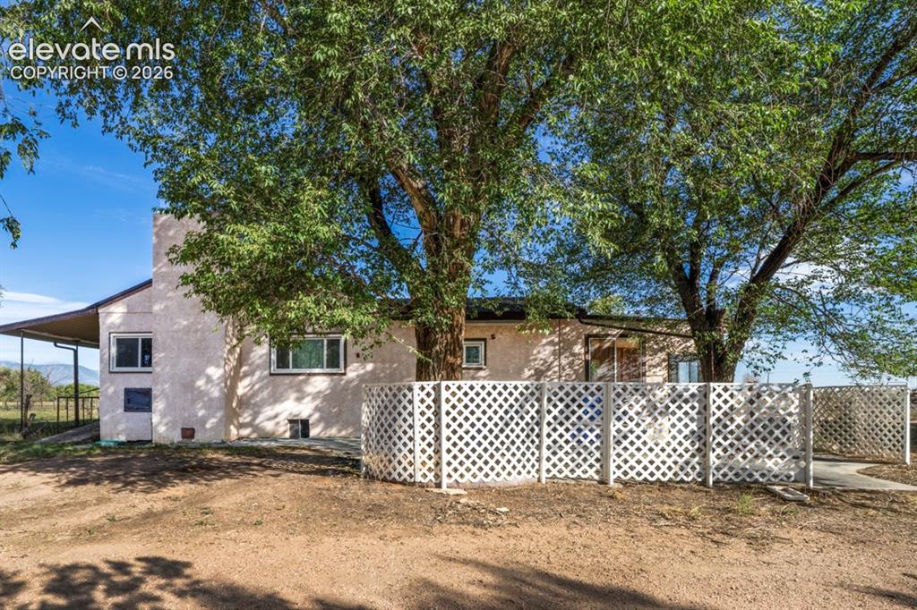 Image 32 of 45: Stucco exterior