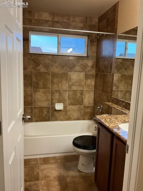 Image 16 of 29: Upstairs Full bathroom featuring vanity, shower / tub combination, and heal