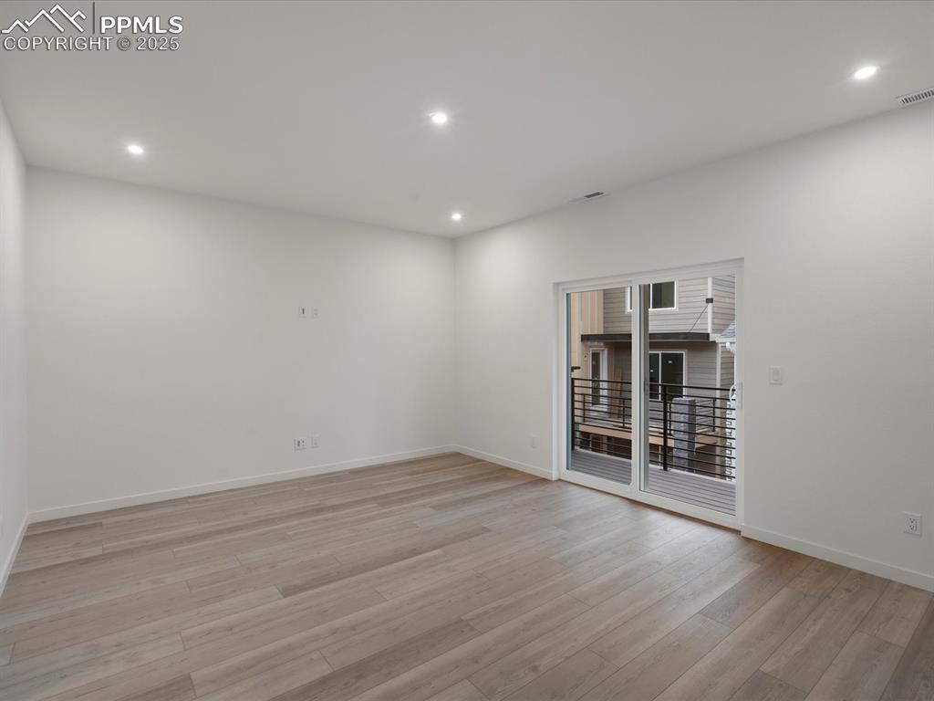 Image 13 of 32: Spare room featuring recessed lighting and light wood-type flooring
