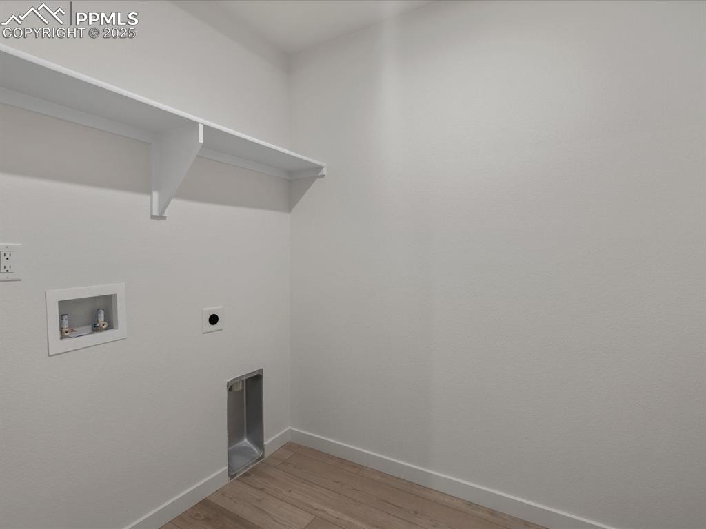 Image 22 of 32: Washroom featuring hookup for a washing machine, hookup for an electric dry