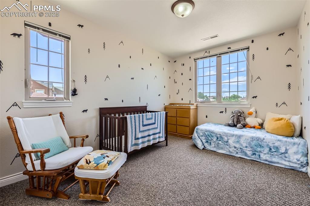 Image 16 of 28: Bedroom featuring carpet