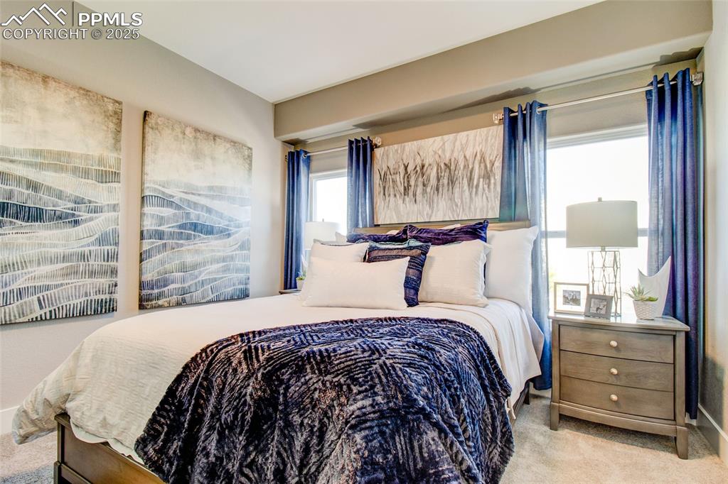 Image 18 of 30: Bedroom featuring carpet floors