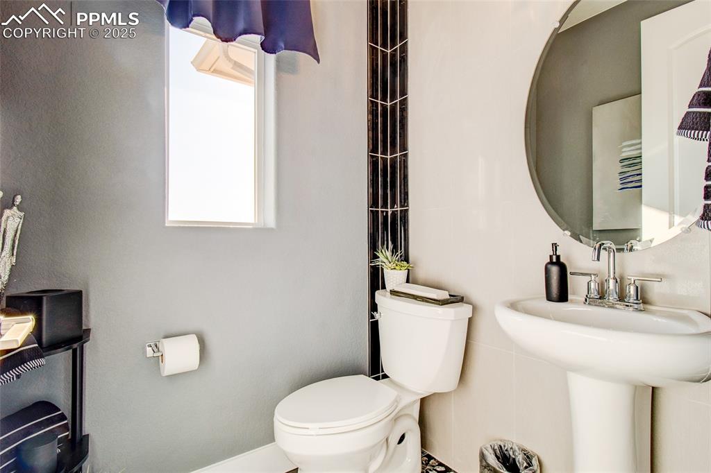 Image 3 of 30: Bathroom featuring toilet