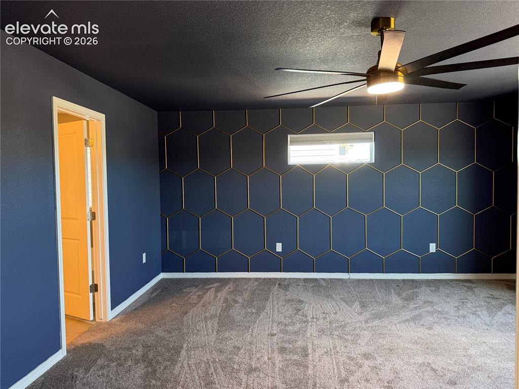 Image 16 of 24: Accent wall featuring hexagonal molding