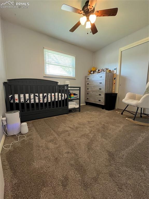 Image 12 of 29: Bedroom featuring carpet flooring and a ceiling fan