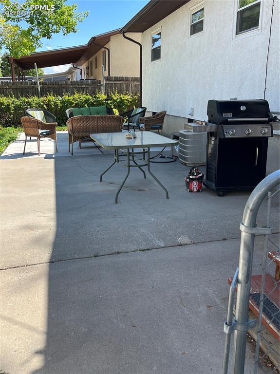 Image 25 of 29: View of patio / terrace featuring area for grilling