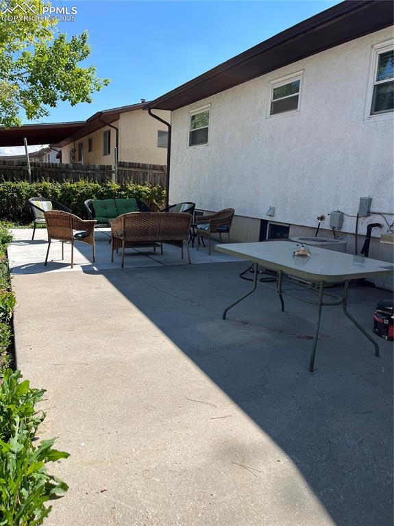 Image 28 of 29: View of patio / terrace with an outdoor living space
