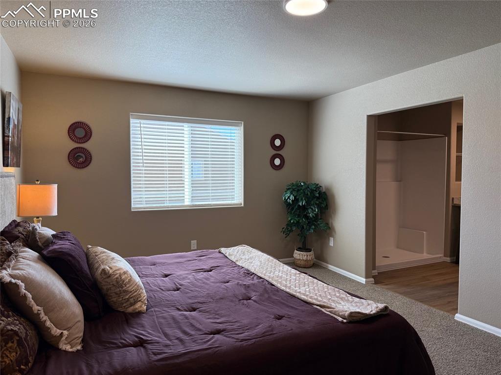 Image 22 of 38: Bedroom