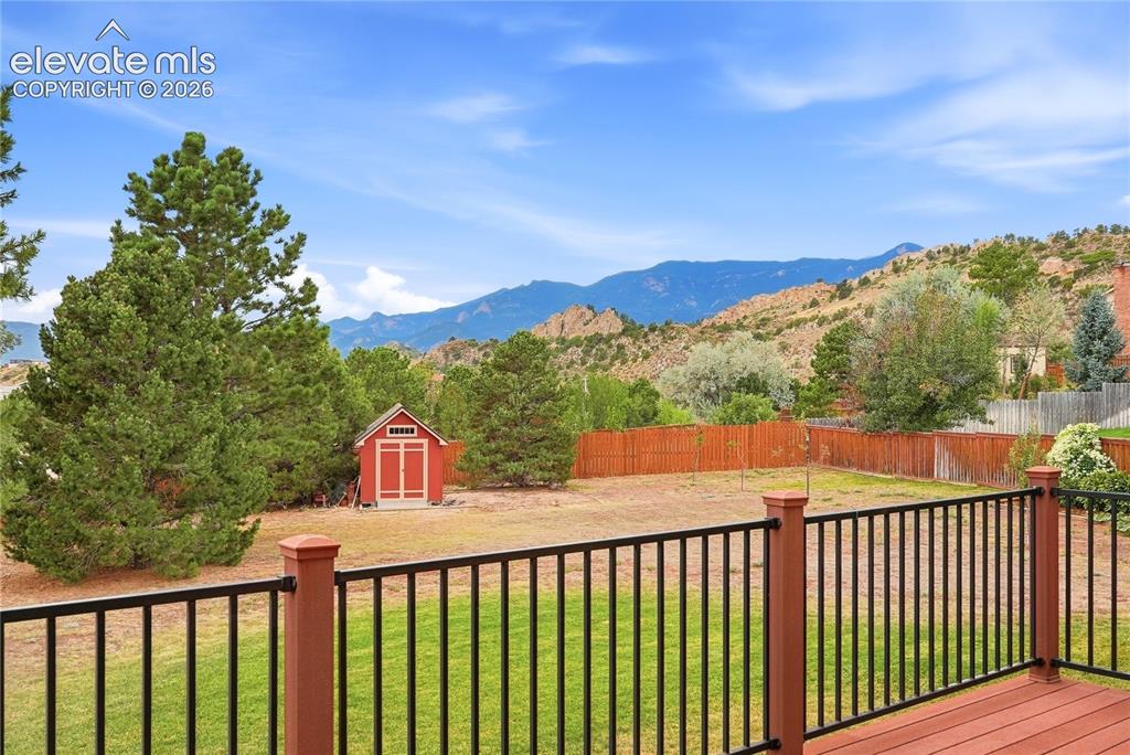 Image 2 of 46: Expansive backyard with stunning views