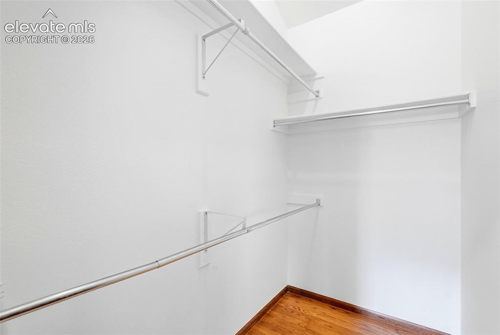 Image 30 of 46: Primary closet