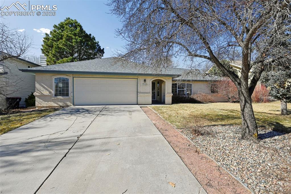 Caption: Stucco ranch home