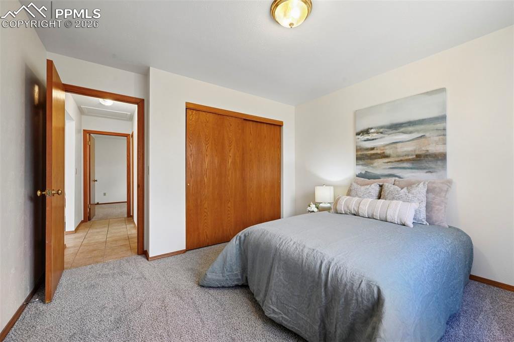 Image 24 of 42: Second bedroom on main level