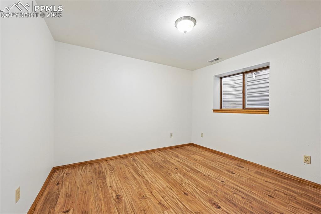 Image 33 of 42: Fifth bedroom, basement