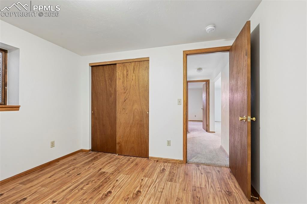 Image 34 of 42: Fifth bedroom, basement