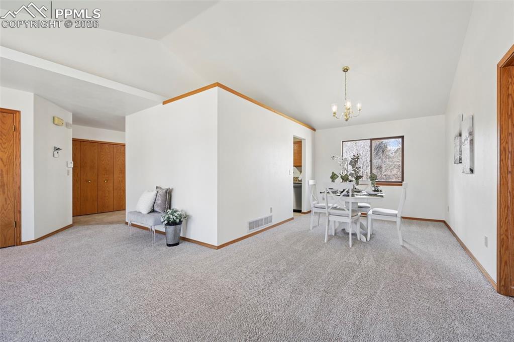 Image 7 of 42: Access from living room and kitchen