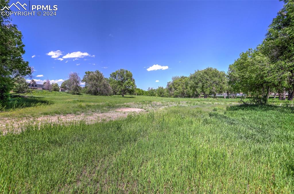 Image 3 of 5: View of yard with a rural view
