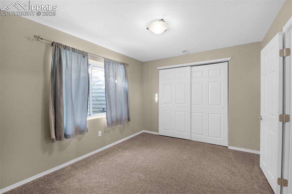 Image 36 of 50: Second Basement bedroom 