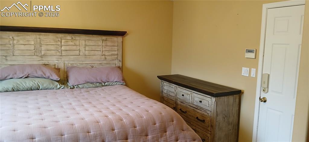 Image 14 of 23: Bedroom