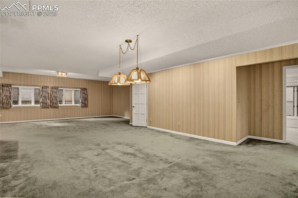 Image 28 of 41: Spacious casual area for games, TV, or dining